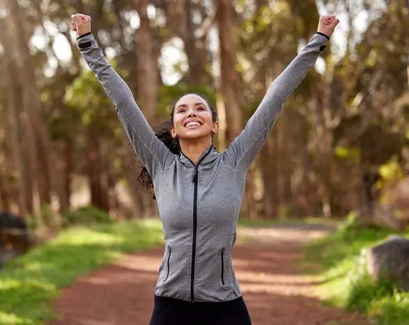 Confident woman jogger